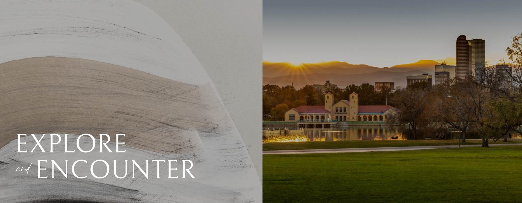 a building with a large lawn and trees in the front